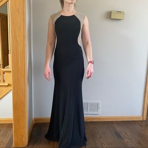 Black floor length gown with crystal back